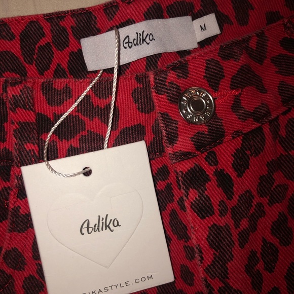 Adika red & black cheetah pants/jeans. Brand new. - Picture 4 of 5